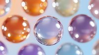 Colorful soap bubbles floating on light blue background with bokeh effect and reflections, macro photography showing transparent spheres with rainbow iridescence.