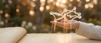 Hands holding glowing gift box with golden light trails against blurred bokeh background, symbolizing generosity, celebration, and special moments for holiday and festive designs.