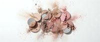 Crushed eyeshadow palette with neutral tones scattered on white background. Broken makeup powder in beige, brown and pink shades for beauty cosmetics design.