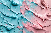 Pastel pink and turquoise cosmetic cream texture with smooth swirls and waves creating abstract pattern on surface, suitable for beauty product marketing.