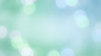 Soft pastel bokeh background with dreamy light effects in mint green and blue tones for spring designs and peaceful wellness concepts.