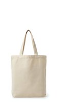 Blank natural cotton tote bag with long handles isolated on white background, ready for custom design, printing, or branding projects.