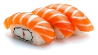 Fresh salmon nigiri sushi pieces with raw fish slices layered over pressed rice, arranged in row on white background, isolated food photography for menu design.
