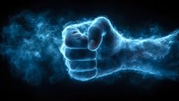 Glowing blue fist emerging from smoky effect against black background creates dramatic power symbol for strength and determination concepts.