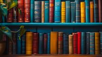 Vintage hardcover books arranged on wooden turquoise shelves create nostalgic library atmosphere with colorful spines in red, blue, and golden tones.