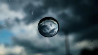 Soap bubble floating against dramatic stormy sky with dark clouds and water droplets creating atmospheric weather scene for nature photography.