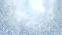 Frost-covered foliage and snowflakes create an elegant winter border on soft blurred background, suitable for seasonal greeting cards and holiday designs.