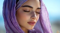 Young Middle Eastern woman wearing purple hijab with closed eyes and serene expression against blurred blue background, soft natural lighting highlights peaceful mood.