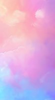 Dreamy pastel sky background with soft pink, purple and blue gradient clouds creates ethereal atmosphere for romantic and magical designs.