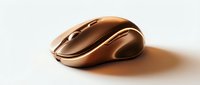 Luxurious golden bronze wireless computer mouse with glossy metallic finish, isolated on white background for tech and design projects.
