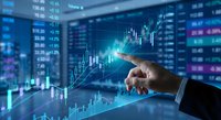 Businessman hand pointing at financial chart with stock market data on digital screen for investment analysis and trading strategy planning.
