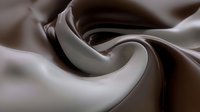 Smooth swirling abstract background in chocolate brown and cream tones creates elegant flowing curves and waves with soft silky texture and gentle gradients.