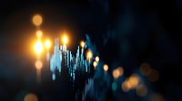 Glowing financial chart with golden and blue bokeh lights showing market data visualization on dark background, abstract business analytics concept.