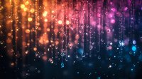 Magical glowing particles falling like rain against dark background with vibrant gradient from orange to pink and blue creating dreamy bokeh effect.