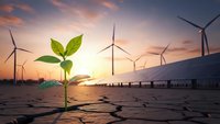 Green plant seedling growing through cracked dry earth with wind turbines and solar panels at sunset representing renewable energy and sustainability.