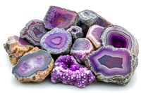 Purple and pink agate crystal slices with druzy quartz formations showing natural banding patterns and geode cross-sections on white background.