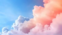 Dreamy coral and blue sky with fluffy cumulus clouds creating ethereal atmosphere. Soft gradient from azure to living coral color adds romantic mood to design projects.