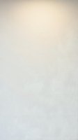 Subtle beige textured background with soft gradient and fine grain surface for elegant design projects and presentations.