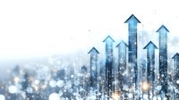 Blue glowing arrows rising upward against cityscape silhouette with bokeh light effects, representing business growth and urban development success.