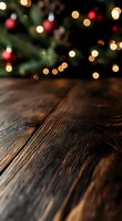 Rustic wooden table surface with defocused Christmas tree lights and red ornaments in background, creating festive holiday atmosphere for product display.