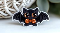 Cute kawaii bat character with orange polka dot bow tie on white background, sticker style design with black wings and big orange eyes, isolated for creative projects.