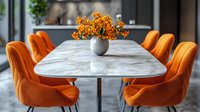 Modern dining room with marble table and vibrant orange velvet chairs, complemented by yellow flowers in gray vase. Minimalist interior design with natural lighting.