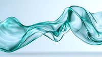 Flowing turquoise silk fabric waves creating elegant smooth curves and transparent layers against white background, suitable for luxury product advertising.