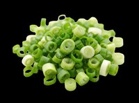 Chopped green onions and scallions isolated on transparent background, ready for culinary design, recipe graphics, food packaging, cooking blogs, restaurant menus, and print-on-demand kitchen products.
