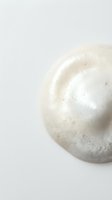 White creamy skincare product texture with smooth application on neutral background for beauty and cosmetic advertising campaigns.