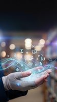 Hand holding glowing digital letters and mathematical symbols floating above palm against blurred urban background. Concept for education, language learning, knowledge, technology.