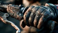 Weathered medieval knight gauntlets with intricate metalwork and leather straps, showcasing ancient armor craftsmanship and historical battle gear details.