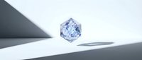 Sparkling blue diamond gemstone floating above modern white surface with geometric shadows and clean minimalist lighting for luxury jewelry design.