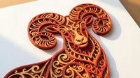 Decorative wooden elephant head with intricate carved patterns and ornamental details, isolated on white background, suitable for home decor, interior design, and craft projects.