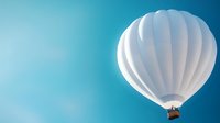 White hot air balloon floating in bright blue sky with soft dreamy atmosphere, minimalist composition with copy space for travel and adventure concepts.