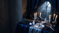 Dark gothic interior with candles, skull, and mystical objects on draped table near arched window for Halloween, occult, or horror themed designs.