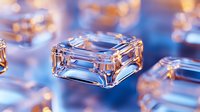 Crystal clear glass square container floating on blue background with soft bokeh lights creating luxurious atmosphere. Elegant minimalist composition.