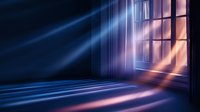Dramatic light beams streaming through window creating atmospheric shadows and reflections in empty room with blue and orange color gradient effects.