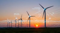 Wind turbines generating renewable energy at sunset with digital network connections representing smart grid technology and sustainable power solutions.