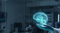 Futuristic holographic brain projection floating above open palm in modern medical laboratory setting showcasing artificial intelligence and neuroscience technology.