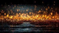 Golden bokeh lights sparkle above wet surface creating magical atmosphere for luxury backgrounds, celebrations, and premium design projects.