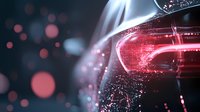 Glowing red car taillight closeup with smoke effect and bokeh lights on dark background, modern automotive design detail highlighting contemporary style.