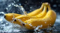 Fresh yellow bananas with dynamic water splash and droplets against dark background, dramatic food photography with motion freeze effect and bokeh lights.