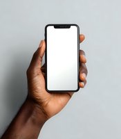 Hand holding modern smartphone with blank white screen against neutral gray background, perfect for app or website mockup presentation.