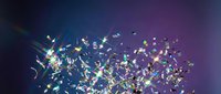 Colorful confetti and streamers falling against gradient purple blue background for celebration party events and festive occasions.