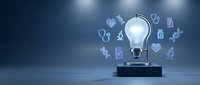 Glowing light bulb on pedestal with floating holographic icons representing innovation, creativity and business ideas in modern blue environment.