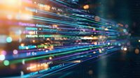 Abstract programming code streams with colorful light trails and bokeh effects creating dynamic technology background for software development projects.