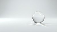 Transparent glass sphere with glossy reflective surface on white isolated background, suitable for design projects and digital compositions.