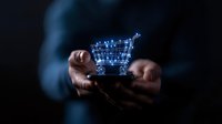 Digital shopping cart hologram floating above hands in dark background, futuristic retail technology concept showing modern commerce innovation.