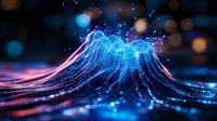 Glowing wave of blue and pink light particles creating dynamic motion effect against dark background with bokeh lights and sparkles. For technology backgrounds.