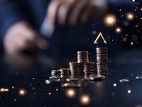 Stacks of silver coins forming ascending graph with glowing arrow and bokeh lights on dark background, representing financial growth and investment success.